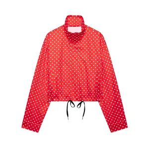 Short red polka dot bomber jacket with stand collar and adjustable drawstring hem