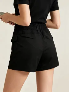 Detailed back view of high-waist black casual shorts with elastic waistband and pocket