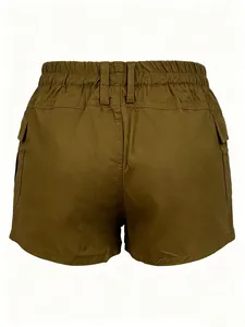Detail of the elastic waistband and cargo side pockets on these brown utility shorts