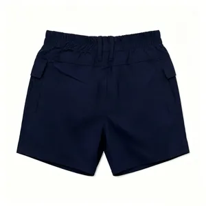 Detailed flat lay of deep blue workwear shorts featuring elastic waist and side cargo pockets