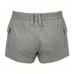Back view of grey cargo shorts featuring elastic waistband and flap pockets on sides