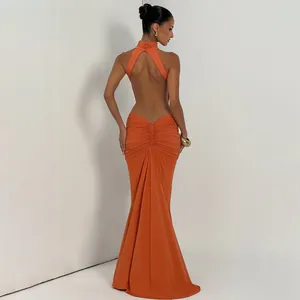 Elegant orange backless halter evening dress with ruched mermaid fishtail silhouette