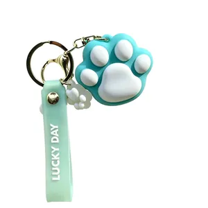 Cute blue cat paw keychain with Lucky Day rubber strap and golden lobster clasp