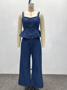Detail of dark blue striped denim set with ruffled zip-up top and straight-leg trousers