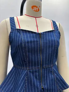 Detail of dark blue striped peplum top with front zipper and contrast stitching