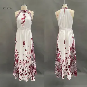Front and back detail of a halter maxi dress featuring leopard and floral print patterns