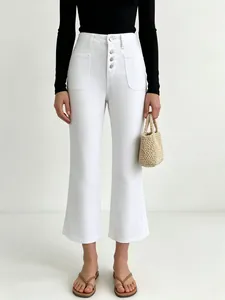 White high-waisted wide-leg denim pants featuring a vintage button-fly front design.