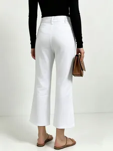 Back view of white high-waist wide-leg denim pants featuring a retro straight-cut fit