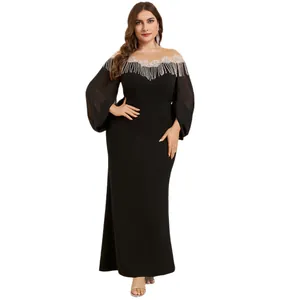 Elegant black evening gown with champagne bead fringe and sheer lantern sleeves
