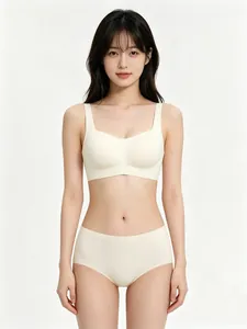 Front view of seamless square neck bralette set in cream white soft fabric for women