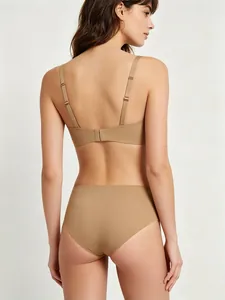 Back view of a seamless square neck bra set in nude with adjustable straps and soft support
