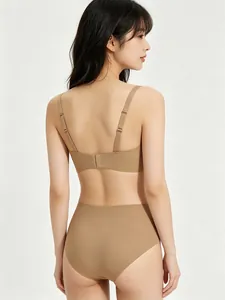 Detail of nude seamless lingerie set showing the back clasp and adjustable straps