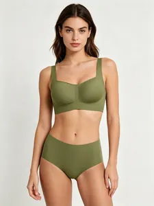 Detail of seamless square neck bralette set in olive green with laser-cut edges