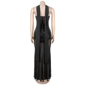 Detailed back view of a black sequin evening gown with mesh halter and long fabric ties