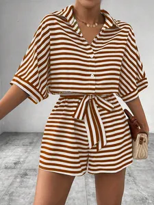Detail of striped short-sleeve shirt with buttons and matching drawstring shorts set