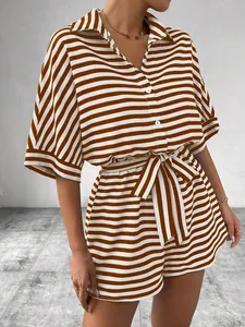 Detail of striped short set showing V-neck button shirt and tie-waist shorts with bow