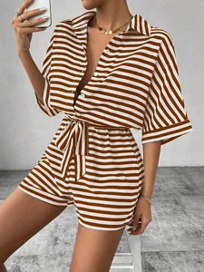 Close-up of brown striped short sleeve shirt and matching drawstring shorts set