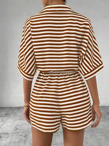 Rear view of women's two-piece striped set showing back alignment of the woven fabric