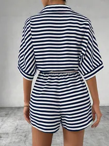 Detailed back view of a navy and white striped short sleeve summer jumpsuit for women