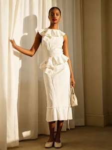 Elegant white sleeveless cotton linen midi dress featuring ruffled tiers and belted waist