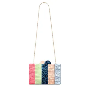 Modern multicolor acrylic evening clutch with marble pattern and gold chain strap