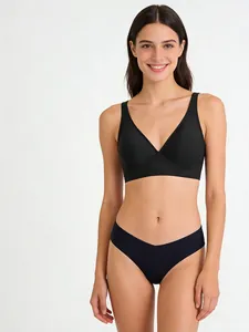 Detail of black seamless V-neck wireless lingerie set with matching seamless panty for women