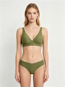 Detail view of seamless olive green wireless bra and panty set with V-neck design