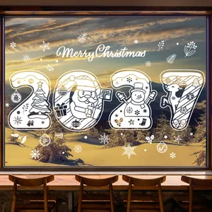 White Christmas window stickers featuring 2027 lettering with Santa and reindeer motifs