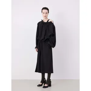 Minimalist black off-shoulder long sleeve dress with drawstring waist and loose fit