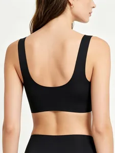 Rear view of seamless black V-neck sports bra with wide straps and deep U-shaped back design