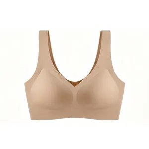 Seamless V-neck beige sports bra with wide straps for comfort and smooth silhouette