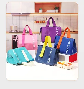 Various colors of insulated lunch bags with Happy Day print and sturdy handles