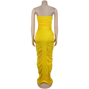Back view of a vibrant yellow strapless ruched bodycon maxi dress on a mannequin