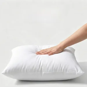 Detail showing high-resilience white pillow cushion insert with soft texture and bounce