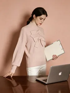 Elegant pink high-neck knit sweater with 3D bow details and stylish lantern sleeves