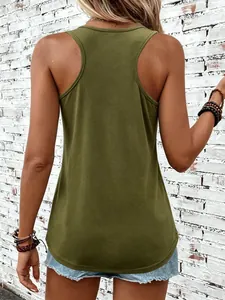 Back view of a casual olive green ribbed tank top paired with light blue denim shorts