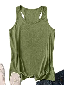 Flat lay of olive green racerback tank top with denim shorts and pearl sandals