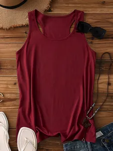 Detailed flat lay of a wine red summer tank top on a dark wooden background