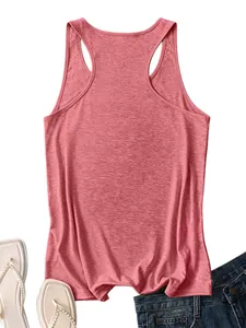 Flat lay of pink heather racerback tank top with denim shorts and pearl flip-flops