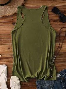 Detailed flat lay of an army green racerback tank top with summer fashion accessories