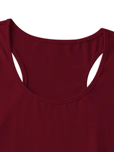 Close-up of deep red ribbed knit tank top showing high-quality neckline stitching
