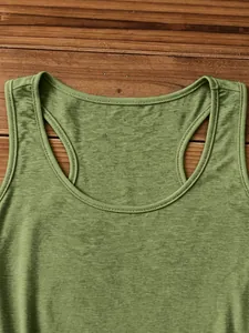 Detail of green heather fabric texture and double-stitched neckline on tank top