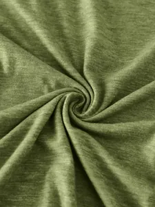 Detailed macro view of olive green ribbed knit fabric with soft heathered texture