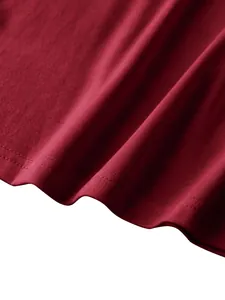 Detail shot of wine red tank top hem featuring professional double-needle stitching