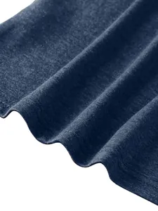 Detailed close-up of dark blue knitted fabric with twin-needle stitching on the hem