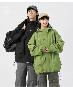 Detail of adjustable drawstring hood and shoulder fit on outdoor windbreaker jackets