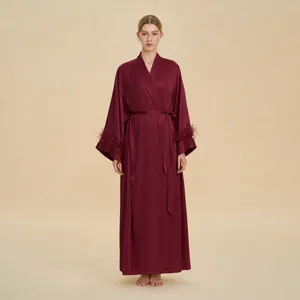 Luxurious wine red satin robe with elegant ostrich feather trim on sleeves and waist belt
