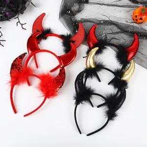 Detail view of five assorted devil horn headbands with sequins and feathers for parties