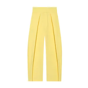 High-waisted pleated balloon trousers in lemon yellow featuring a wide-leg drape style