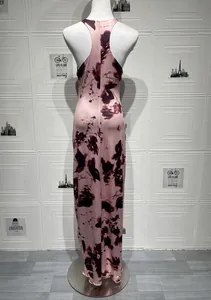 Detail of racerback tie-dye maxi dress showing back silhouette on mannequin